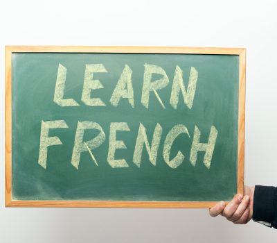 The chalkboard with the "Learn French" text on it.